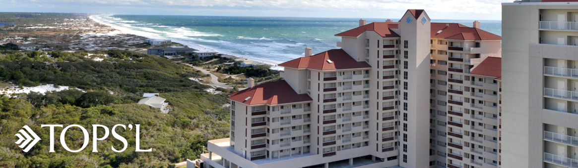 Tops'l Beach Resort condo building overlooking Coffeen Nature Preserve and the Gulf of Mexico.